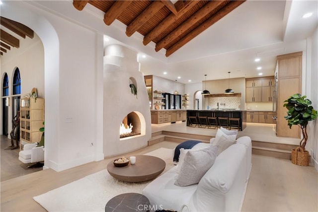 1090 Vista Ridge Ln, Westlake Village, CA 91362 - living area featuring arched walkways, wooden ceiling, recessed lighting, and light wood finished floors