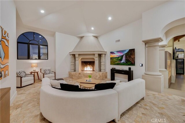 1090 Vista Ridge Ln, Westlake Village, CA 91362 - living area featuring ornate columns, recessed lighting, lofted ceiling, and baseboards
