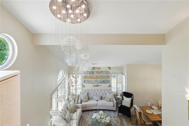 living room featuring a chandelier