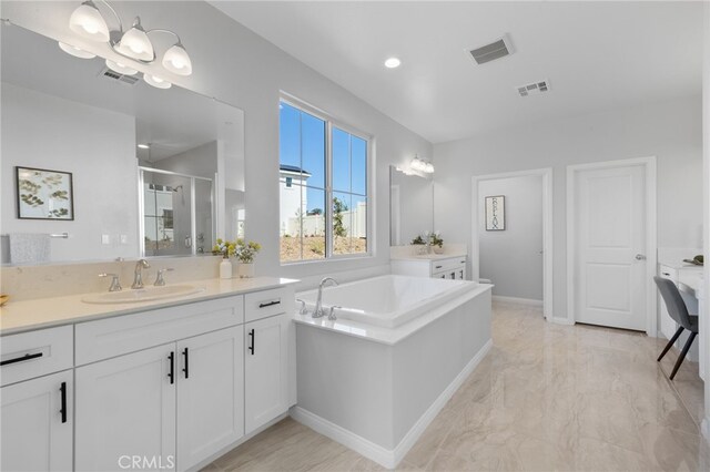 bathroom with vanity, visible vents, marble finish floor, and a stall shower