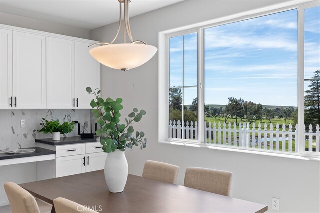 dining room featuring a healthy amount of sunlight