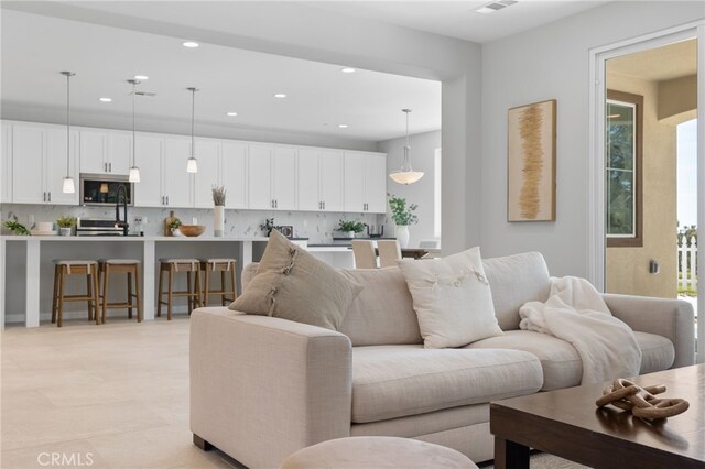 living area with recessed lighting