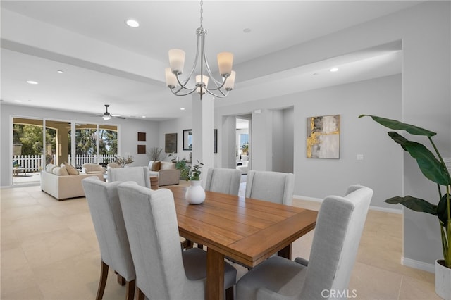 dining space with recessed lighting, baseboards, and ceiling fan with notable chandelier