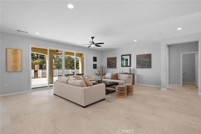 living room with a ceiling fan, light tile patterned flooring, baseboards, visible vents, and recessed lighting