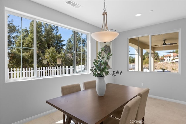 dining area with baseboards, visible vents, recessed lighting, and a healthy amount of sunlight