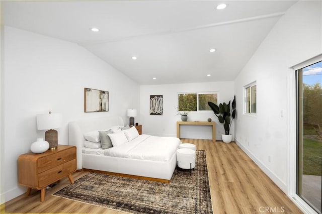 bedroom featuring recessed lighting, vaulted ceiling, access to exterior, and light wood-style flooring