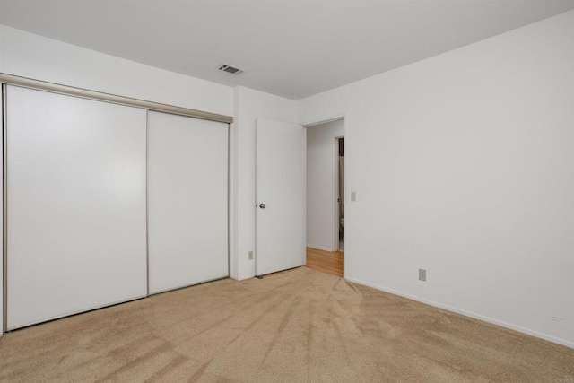 1038 Eider Way, Oceanside, CA 92057 - unfurnished bedroom featuring baseboards, visible vents, carpet, and a closet