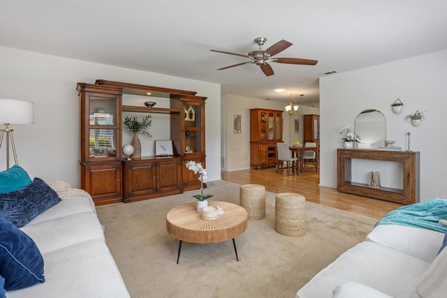 1038 Eider Way, Oceanside, CA 92057 - living room featuring a ceiling fan, light wood-style flooring, and visible vents
