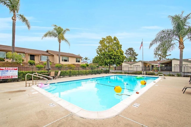 1038 Eider Way, Oceanside, CA 92057 - pool with fence and a patio area