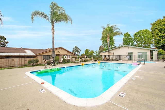 1038 Eider Way, Oceanside, CA 92057 - community pool with a patio area and fence