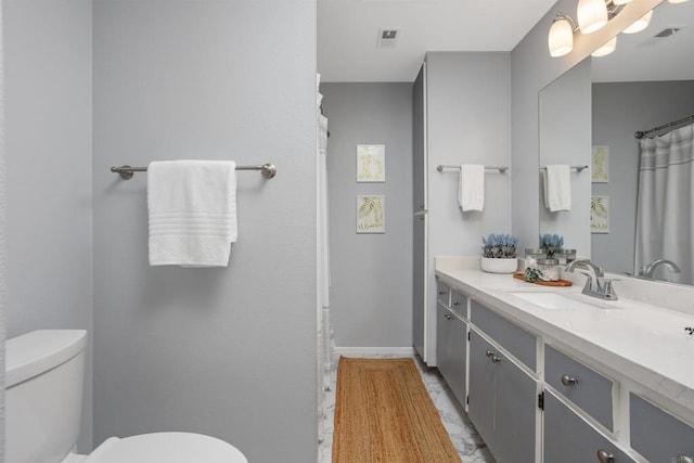 1038 Eider Way, Oceanside, CA 92057 - full bath with vanity, baseboards, toilet, and visible vents