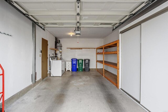 1038 Eider Way, Oceanside, CA 92057 - garage featuring washer and clothes dryer, baseboards, and a garage door opener