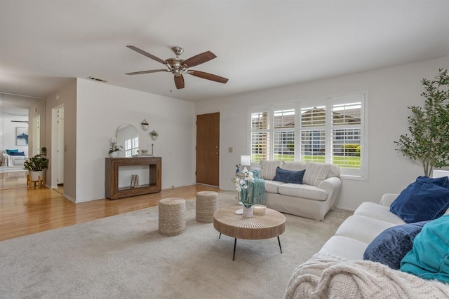 1038 Eider Way, Oceanside, CA 92057 - living room with ceiling fan, wood finished floors, and carpet flooring
