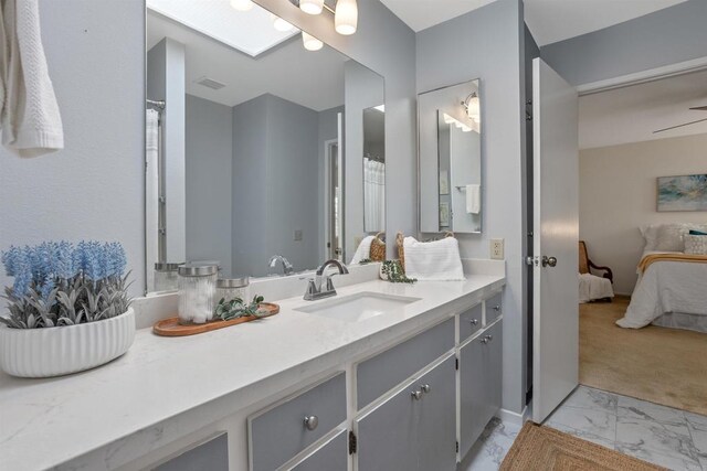 1038 Eider Way, Oceanside, CA 92057 - bathroom featuring vanity, marble finish floors, and ensuite bath