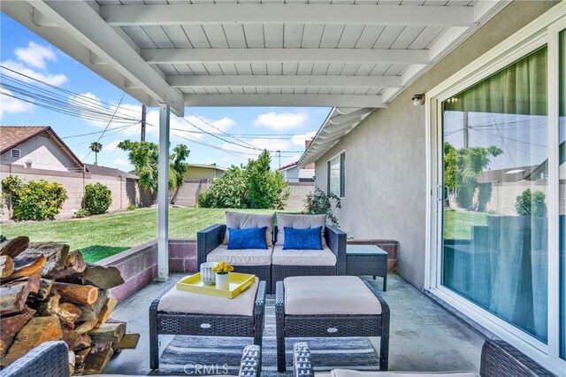 view of patio / terrace with an outdoor hangout area and a fenced backyard