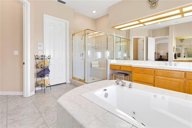 bathroom featuring visible vents, vanity, a shower stall, and a tub with jets