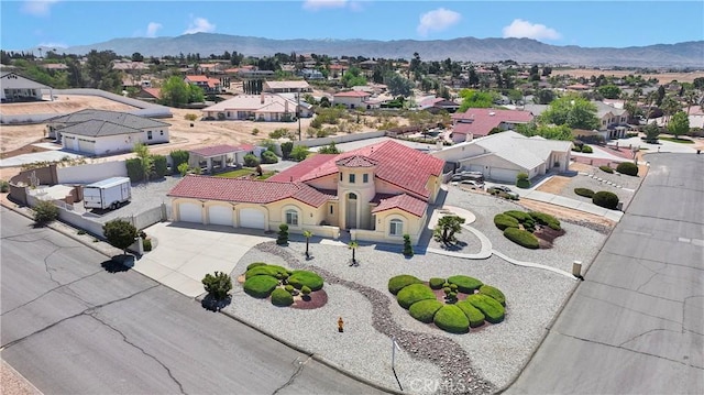 bird's eye view with a residential view and a mountain view