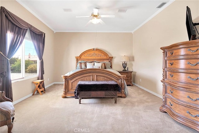 bedroom with light carpet, crown molding, visible vents, and baseboards