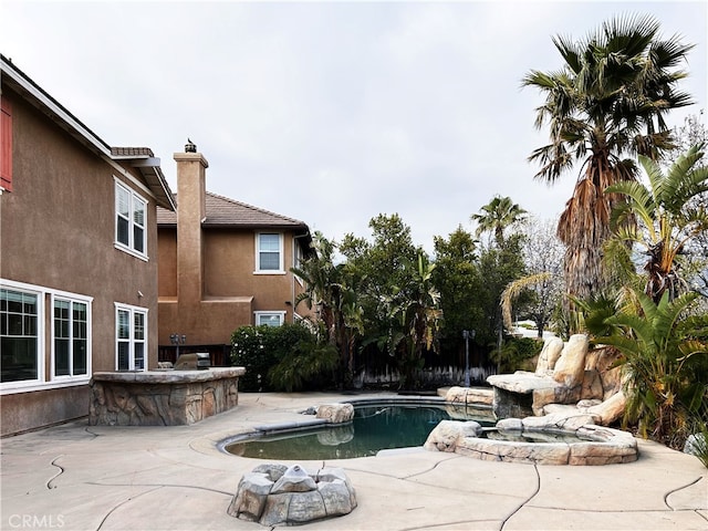 5743 Kendall Ct, Rancho Cucamonga, CA 91739 - view of swimming pool with a patio area