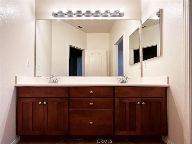 5743 Kendall Ct, Rancho Cucamonga, CA 91739 - full bath featuring baseboards and double vanity