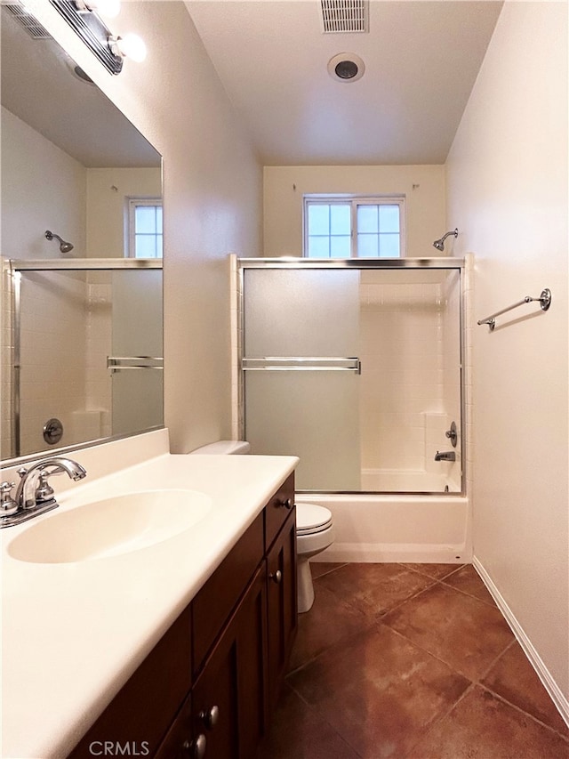 5743 Kendall Ct, Rancho Cucamonga, CA 91739 - full bath with tile patterned flooring, healthy amount of natural light, toilet, and vanity