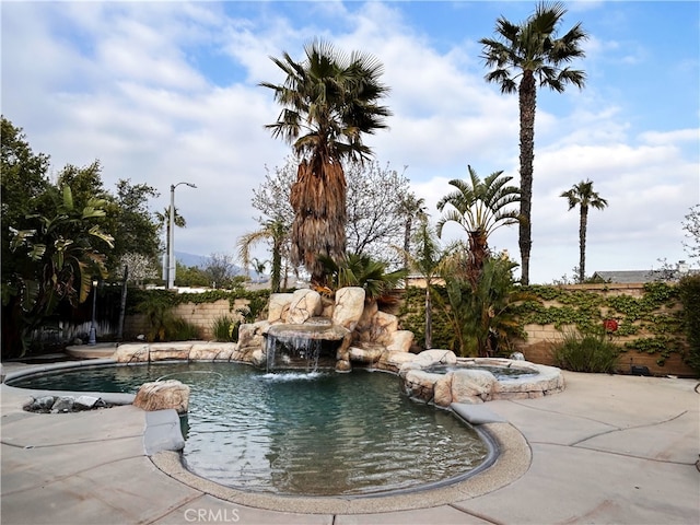 5743 Kendall Ct, Rancho Cucamonga, CA 91739 - view of pool with a pool with connected hot tub