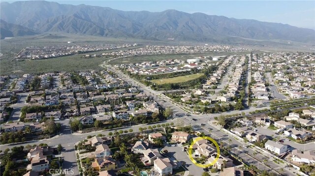 5743 Kendall Ct, Rancho Cucamonga, CA 91739 - aerial overview of property's location featuring nearby suburban area and mountains
