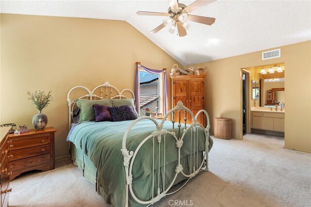 19852 Pandy Ct, Canyon Country, CA 91351 - bedroom featuring lofted ceiling, light carpet, visible vents, and connected bathroom