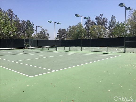 19852 Pandy Ct, Canyon Country, CA 91351 - view of tennis court featuring fence and community basketball court