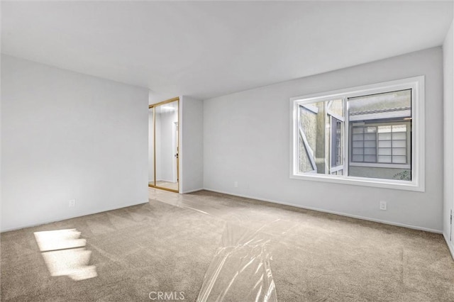 18324 Clark St Unit 315, Tarzana, CA 91356 - empty room featuring carpet floors and baseboards