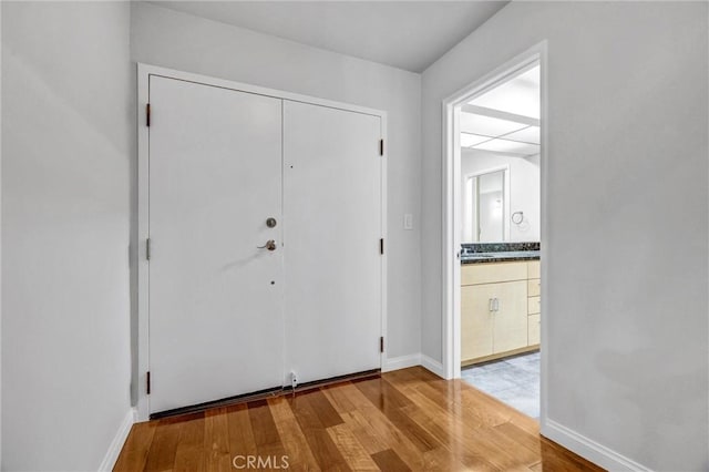 18324 Clark St Unit 315, Tarzana, CA 91356 - entryway featuring wood finished floors and baseboards