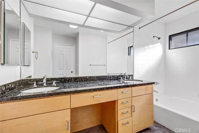 18324 Clark St Unit 315, Tarzana, CA 91356 - full bathroom featuring tile patterned floors, shower / bath combination, a sink, and double vanity