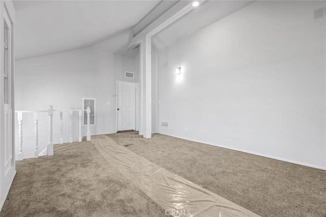18324 Clark St Unit 315, Tarzana, CA 91356 - unfurnished room featuring high vaulted ceiling, baseboards, visible vents, and carpet