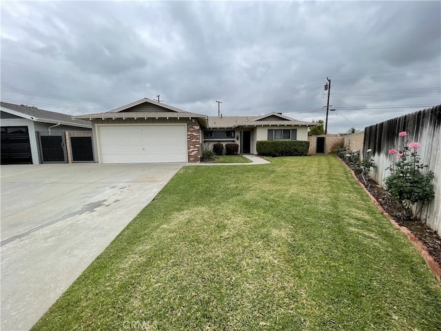 ranch-style house with fence, an attached garage, brick siding, a front yard, and concrete driveway