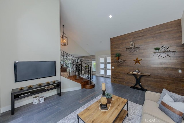 4738 E Fairfield St, Anaheim Hills, CA 92807 - living room with french doors, high vaulted ceiling, stairs, wood finished floors, and baseboards