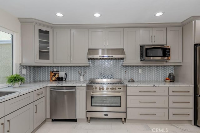 4738 E Fairfield St, Anaheim Hills, CA 92807 - kitchen featuring appliances with stainless steel finishes, under cabinet range hood, gray cabinets, light stone counters, and recessed lighting