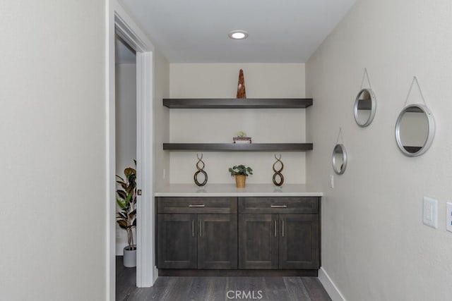4738 E Fairfield St, Anaheim Hills, CA 92807 - bar area featuring dark wood-type flooring and baseboards