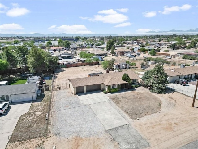 birds eye view of property featuring a residential view and a mountain view