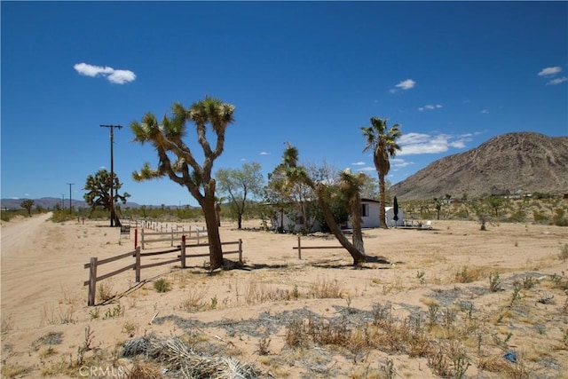 59460 Applegate Way, Landers, CA 92285 - view of yard featuring a rural view, fence, and a mountain view