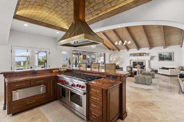 5955 Lake Vista Dr, Bonsall, CA 92003 - kitchen featuring range with two ovens, dark countertops, vaulted ceiling with beams, and a warming drawer