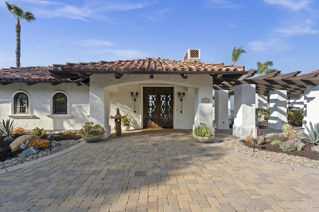 5955 Lake Vista Dr, Bonsall, CA 92003 - mediterranean / spanish-style home with french doors, a tile roof, and stucco siding