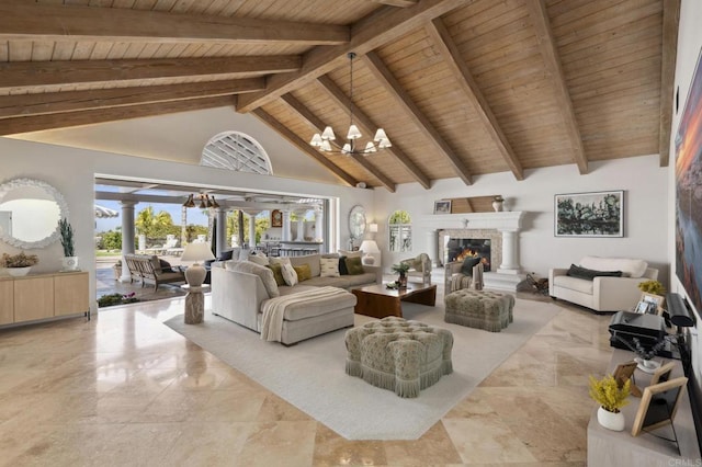 5955 Lake Vista Dr, Bonsall, CA 92003 - living area with high vaulted ceiling, a glass covered fireplace, wooden ceiling, and beamed ceiling