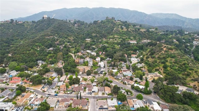 bird's eye view with a mountain view