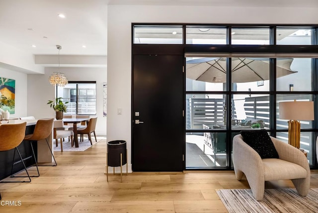 178 S Euclid Ave Unit 402, Pasadena, CA 91101 - entrance foyer featuring light wood-style flooring, a chandelier, and recessed lighting