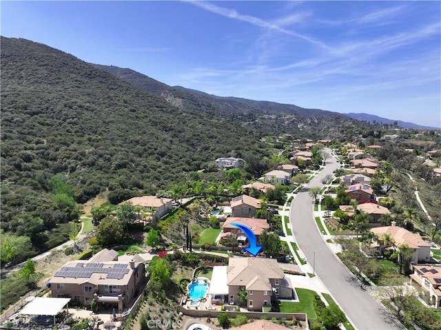 1560 Vandagriff Way, Corona, CA 92883 - aerial perspective of suburban area featuring a mountain backdrop and a pool