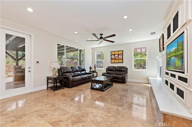 1560 Vandagriff Way, Corona, CA 92883 - living area with marble tiled floors, healthy amount of natural light, baseboards, and recessed lighting
