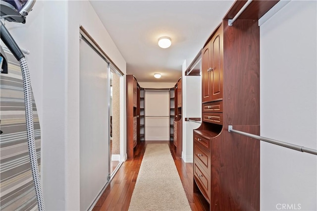 1560 Vandagriff Way, Corona, CA 92883 - walk in closet featuring wood finished floors