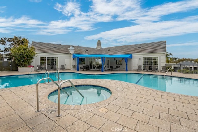 102 Scholz Unit 28, Newport Beach, CA 92663 - community pool with a community hot tub, a patio, fence, and french doors