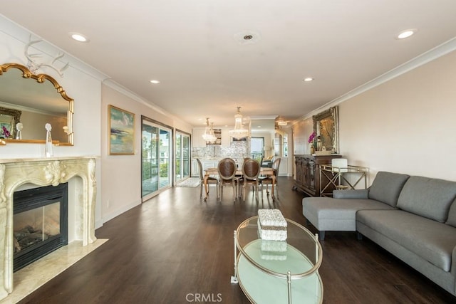 102 Scholz Unit 28, Newport Beach, CA 92663 - living room featuring ornamental molding, wood finished floors, recessed lighting, a premium fireplace, and baseboards