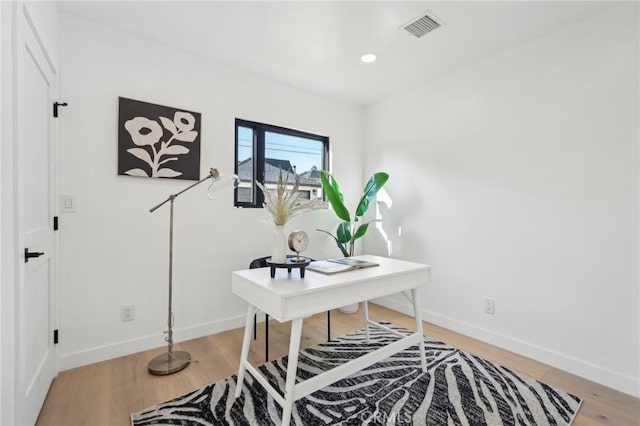 office area featuring recessed lighting, baseboards, visible vents, and light wood-style flooring